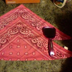 two bandannas, And a pink mirror